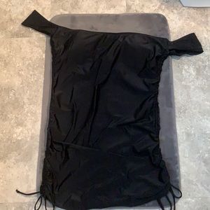 Women’s black off the shoulder swim top.
